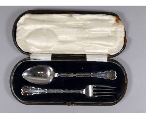 A silver christening fork and spoon - Sheffield 1916, sponsor's mark for Lee &amp; Wigfull, cased, weight 59g.