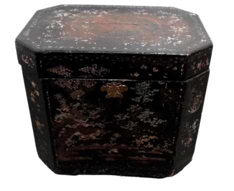A 19th century Chinese black lacquer trunk - of rectangular form with canted corners, decorated in abalone with foliage and l