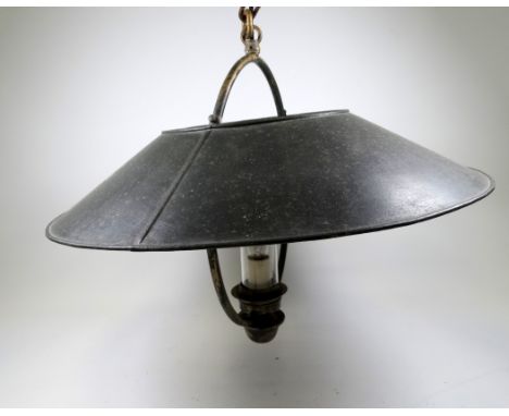 A vintage style ceiling light - with a dark green painted annular shade.