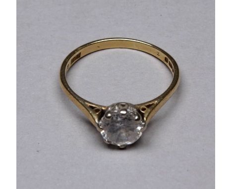 A 9ct yellow gold solitaire ring - set with cubic zirconia, size Q, weight 2.4g. 