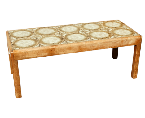A 20th century teak and tile top table by G-Plan - rectangular with buff coloured tiles and raised on moulded square legs, wi