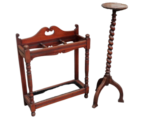 An Edwardian walnut stick stand - rectangular with three sections and a tinplate base, width 68cm, together with an oak torch