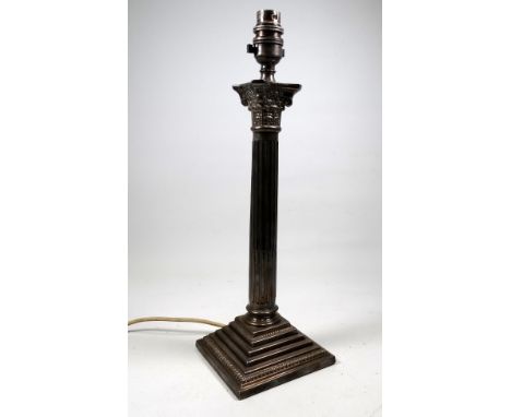 A silver plated table lamp - in the form of a Corinthian column with a square stepped base, height 32cm. 