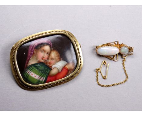 An opal set insect brooch - weight 2.8g, together with a painted plaque brooch set within a yellow metal mount. 