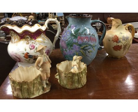 A Royal Worcester ewer together with other pottery items.