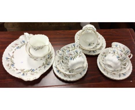 A Royal Albert 'Old Country Roses' part tea service with blue flower pattern.