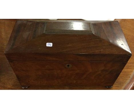 A Georgian mahogany tea caddy.