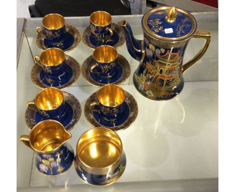 An attractive Carltonware coffee service decorated with bright flowers.