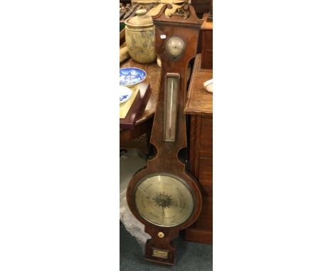 A mahogany banjo barometer.
