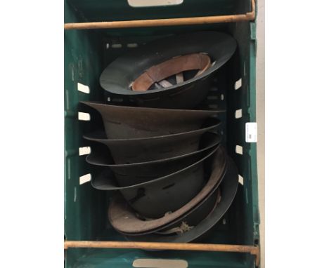 A collection of eight British WWII Fireguard and Street Patrol Air Raid Warden helmets