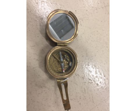 A brass compass