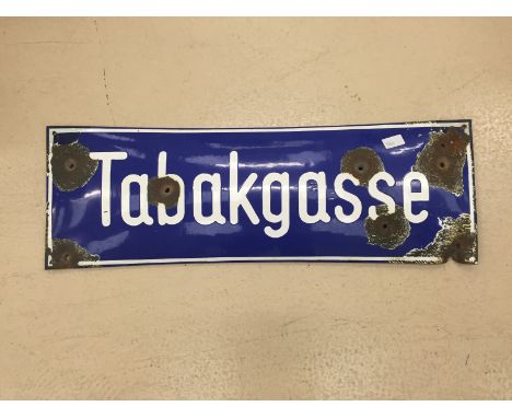 An original German enamel street sign Tabakasse