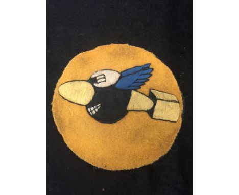 A WWII USAAQF 44th bomber group uniform jacket patch