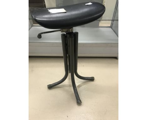 A vintage industrial Faraday worker's stool