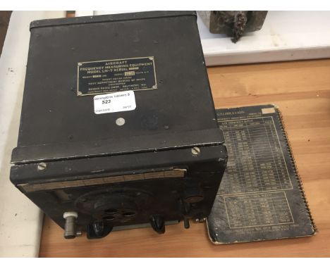 An original WWII USAAF Aircrew radio and manual