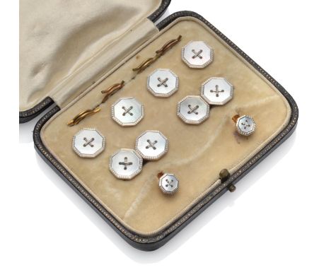 A Mother-of-Pearl Dress Stud Set, the octagonal mother-of-pearl within white engine turned borders, on yellow mounts, the cuf