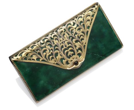 An Art Deco Silver Gilt Cosmetic Case, the green oblong body with pierced foliate mount and onyx cabochon clasp, containing m