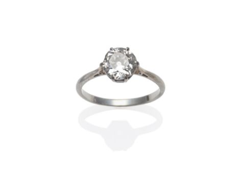 A Diamond Solitaire Ring, the old cut diamond in a white six claw setting, to a tapered shoulder plain polished shank, estima