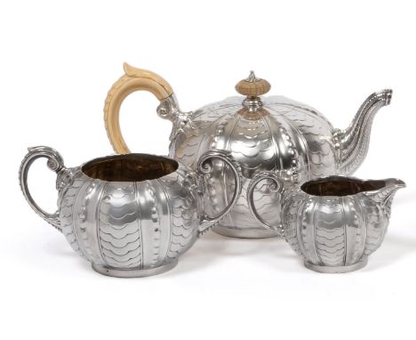 A Victorian Silver Three Piece Tea Service, Frazer & Haws, London 1895, comprising teapot, milk jug and sugar bowl, bullet sh