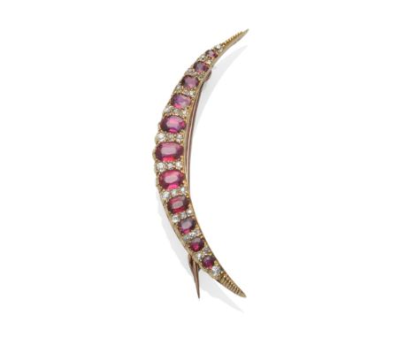A Ruby and Diamond Crescent Brooch, circa 1880, the graduated oval mixed cut rubies alternate with old cut diamonds, in yello