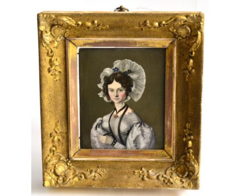 An English Porcelain Portrait Plaque, early 19th century, rectangular, painted with a bust length portrait of a young woman w