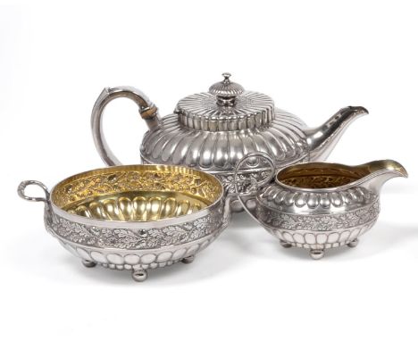 A George IV Silver Three Piece Tea Service, John Watson, Sheffield 1827, comprising teapot, cream jug and sugar bowl, each he