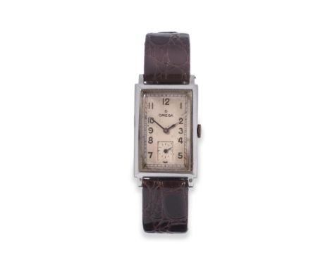 A Stainless Steel Curved Wristwatch, signed Omega, circa 1942, lever movement numbered 9512803, metal dust cover, silvered di