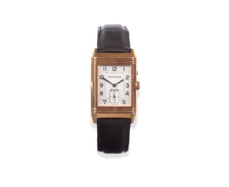 An 18ct Gold Reversible Two Time Zone Day and Night Indications Wristwatch, signed Jaeger LeCoultre, model: Reverso Day-Night