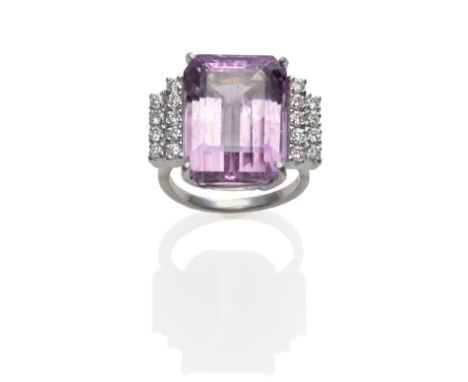 An 18 Carat White Gold Kunzite and Diamond Ring, an emerald-cut kunzite with two rows of round brilliant cut diamonds on each