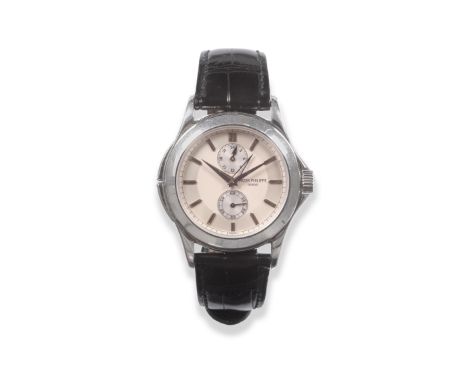 A Fine Platinum Dual Time Zone Wristwatch with 24-hour Indication, signed Patek Philippe, Geneve, model: Calatrava Travel Tim