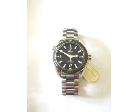 A Stainless Steel Automatic Calendar Centre Seconds Wristwatch, signed Omega, Co-Axial Chronometer, 600m/2000ft, model: Seama