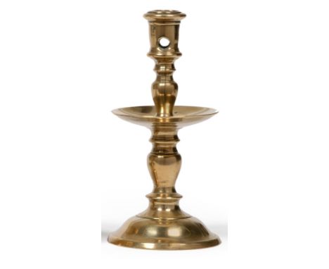 A Brass Heemskerk Type Candlestick, probably Low Countries circa 1580/1620, the low domed foot rising to a knopped stem with 