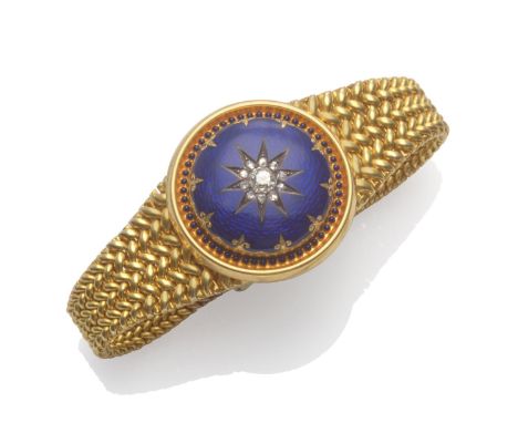 A Diamond and Enamel Bracelet, a graduated fancy link bracelet to a central disk of blue enamel decoration and a rose cut dia