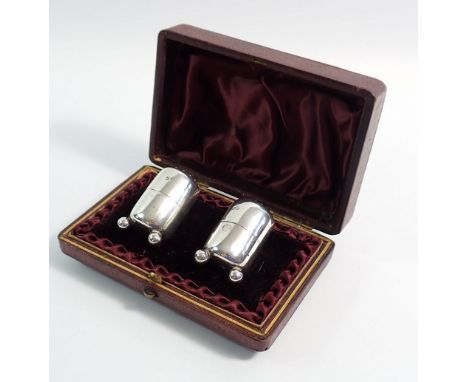 A pair of silver cylindrical pepper pots - cased, 27g, Birmingham 1890 by Haseler Bros, 4cm tall