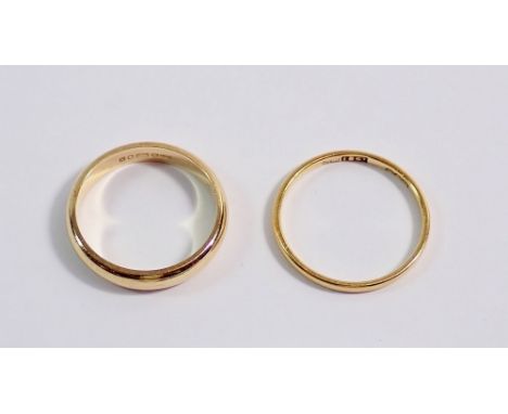 An 18 carat gold wedding ring size N 1.4g and a 9 carat gold one, 3g, size M to N