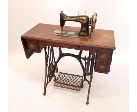 A Singer cast iron base sewing machine 