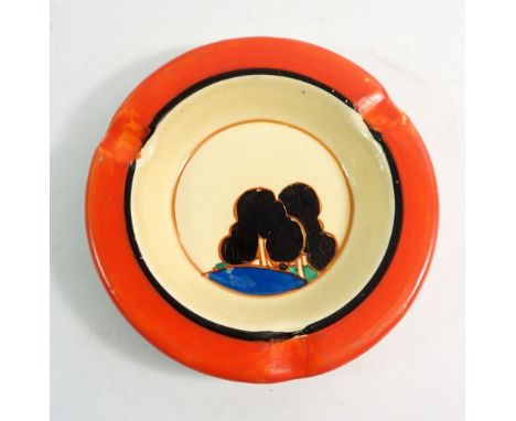 A Clarice Cliff ashtray painted black trees, 11.5cm diameter