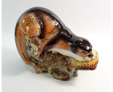 A large Sylvac otter catching a trout No 3459, 17cm tall