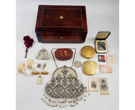 A box of collectables including Ronson lighter, beaded purse etc.