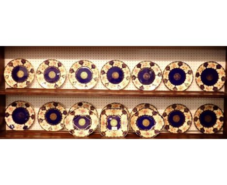 An Aynsley floral printed dessert service pattern no 6911 retailed by Maple of London comprising fifteen plates and three ser