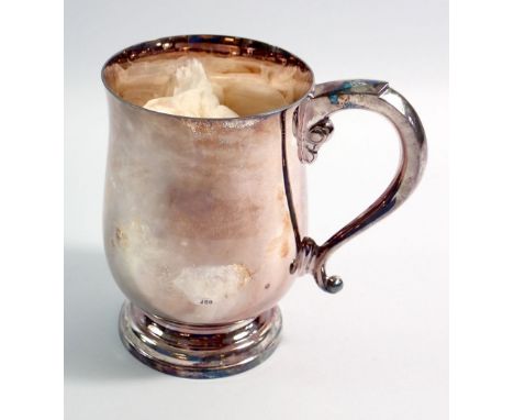 A silver tankard on pedestal foot, boxed by James Dixon, Sheffield 1977, 396g