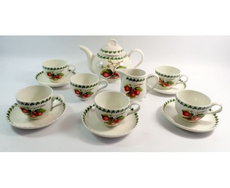 A Portmeirion Strawberry Fair tea set comprising teapot, milk jug, six cups and five saucers