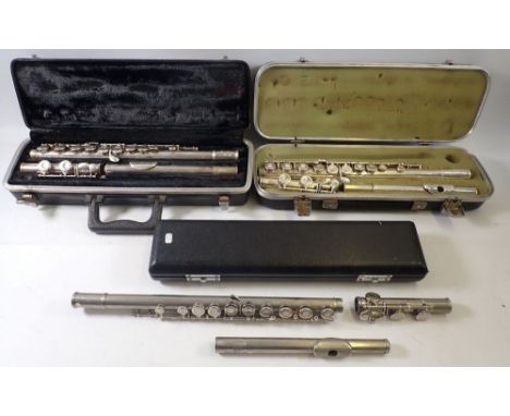 Three silver plated flutes comprising Boosey &amp; Hawkes 'The Edgware', a Bundy flute and an Ewao flute  - all cased
