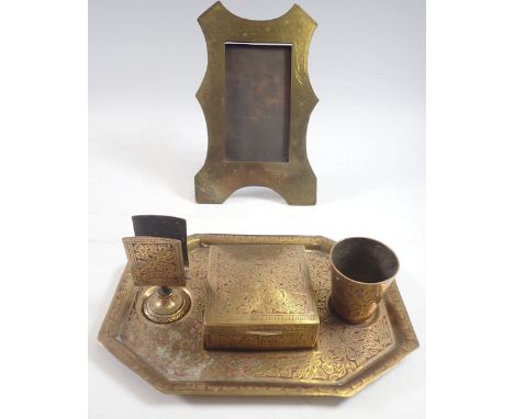 A WWI trench art brass photograph frame dated 1914-1919, 12 x 7cm and an Indian brass smokers desk top companion