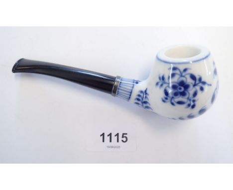 A Copenhagen blue and white porcelain pipe decorated in the onion pattern wtih original box, pipe and leaflet, 14cm