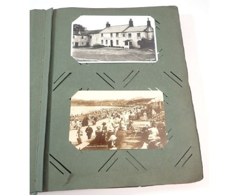 An old postcard album including topos, Bradford Exhibition 1904 silk postcard, Reg Carter, Easter etc. (71)