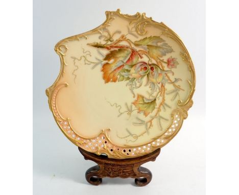 A Royal Worcester ivory blush plate painted autumn leaves and nuts, No 1426, 21.5cm diameter with Chinese hardwood carved pla
