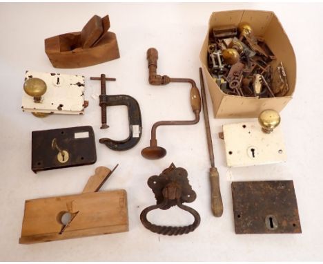 A box of old locks, keys, keeps, escutcheons, handles, large door knocker and other door furniture etc