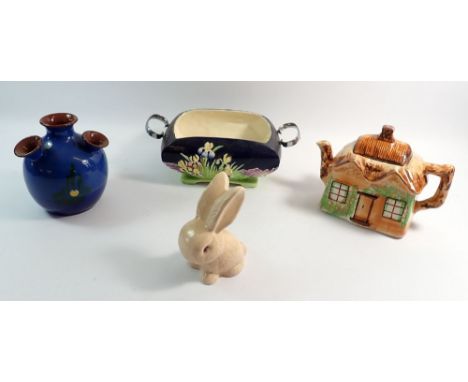 A group of vintage pottery including Sylvac rabbit, cottage ware, Torquay ware etc.