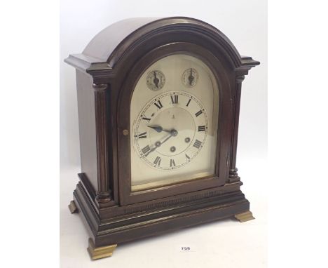 A Victorian mahogany bracket clock with Westminster chime and silvered arch top dial, by Gustave Becker, 40cm